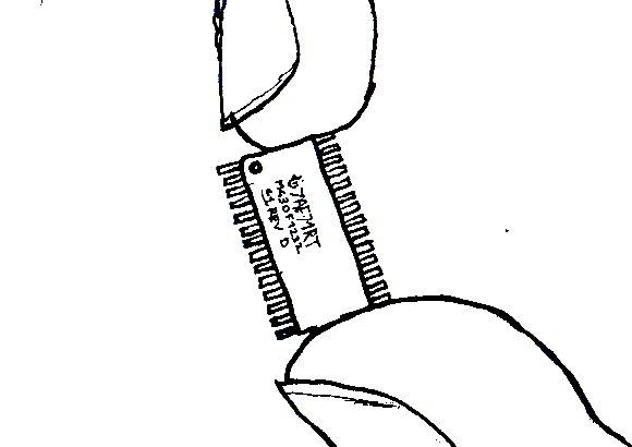 Examine fragments of computers waiting to be made